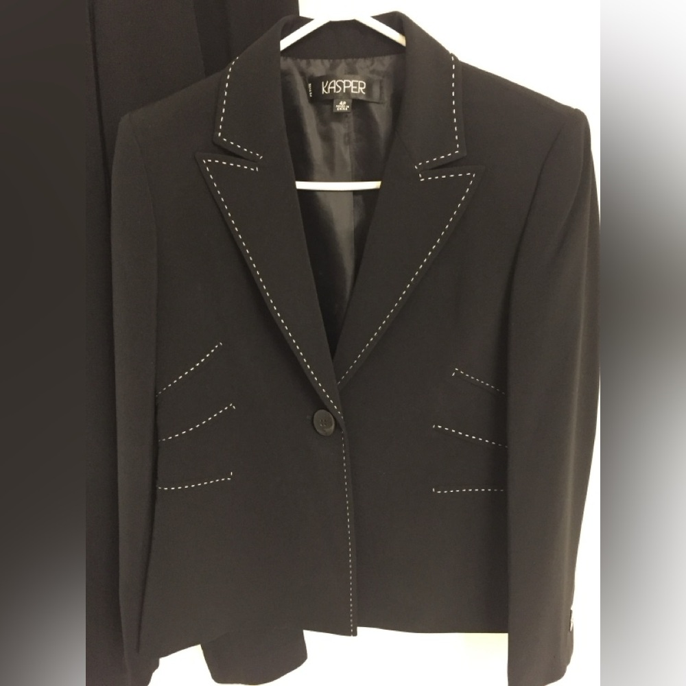 Kasper Classic  Ladies lined Dressy Black Suit with White Dart Seams .